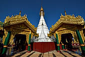 The main white washed stupa inside the cluster of pagodas that make up the Kakku pagoda complex. Shan State, Burma (Myanmar).